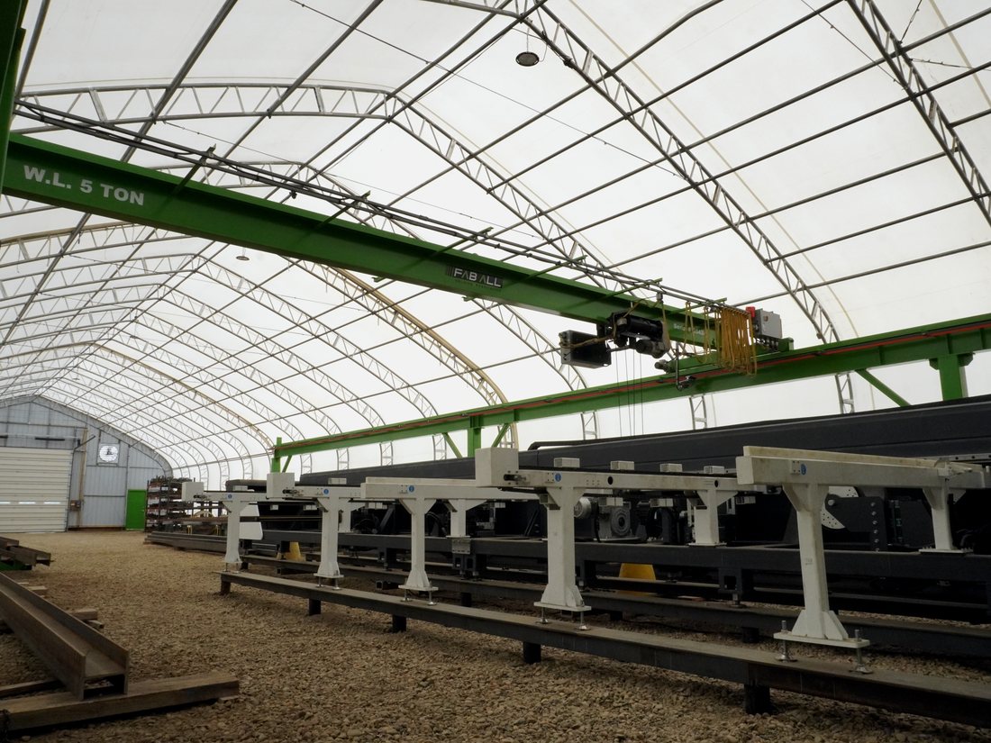 Covered material storage with 5-ton crane